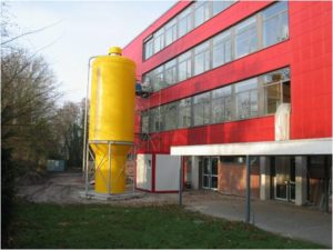 Gebäude in Oldenburg nach Sanierung mit Pelletsilo, Quelle: dena Gebäude in Oldenburg nach Sanierung mit Pelletsilo, Quelle: dena